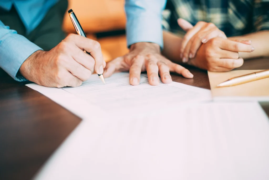 A modern family discussing future plans with a professional offering Will Writing Service Dorking