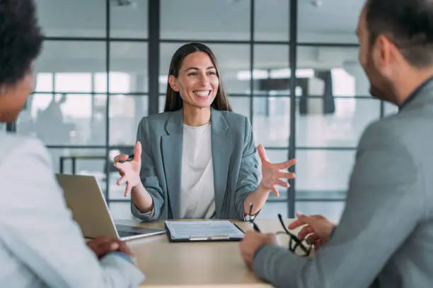A thoughtful person reviewing documents and considering professional Will Writing Services Dorking.
