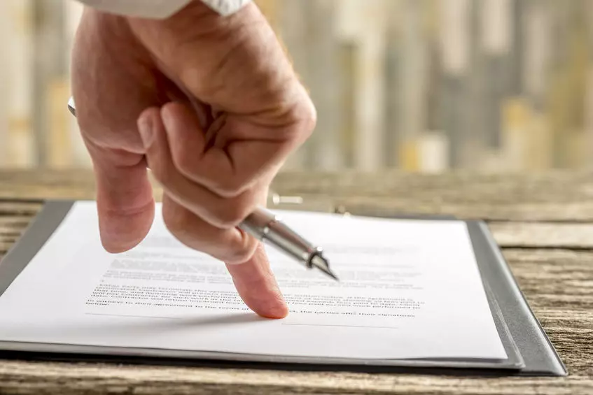 Family meeting with legal advisor, showing when a Will is crucial—highlighting Trusted Will Writing Dorking for essential life planning.